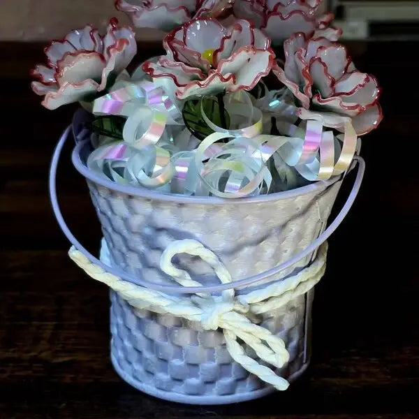 Blossovia customer photo: handmade glass carnation bouquet in decorative pot, real client gift keepsake