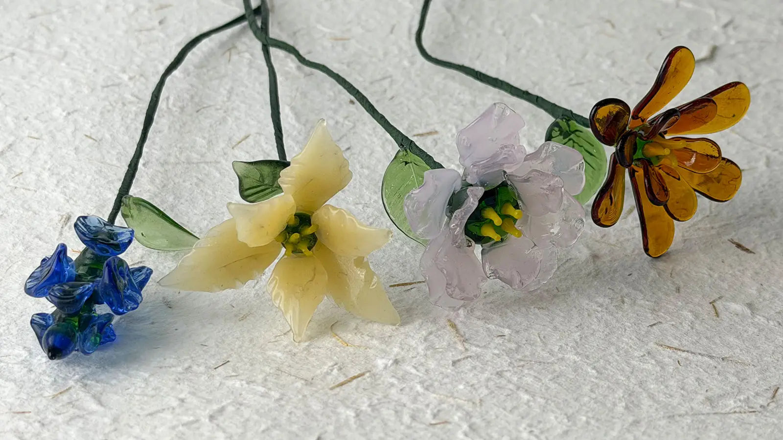 Unauthorized copy of Blossovia original lampwork glass flower set, for copyright comparison only, not a product for sale